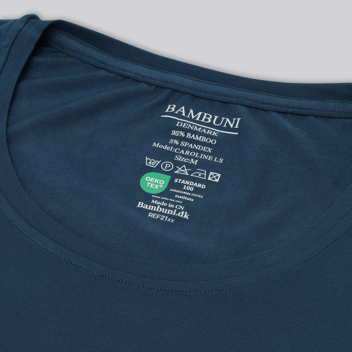 Bambus langærmet t-shirt i petroleumsblå til damer carelabel
