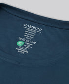 Bambus oversize t-shirt i petroleumsblå til damer carelabel