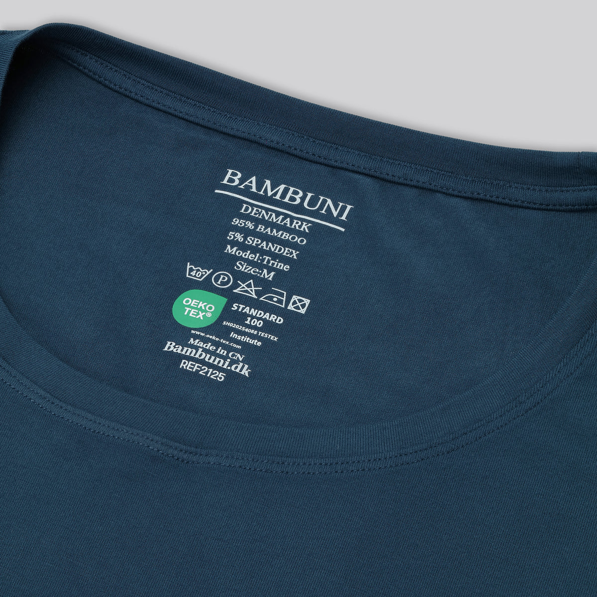 Bambus oversize t-shirt i petroleumsblå til damer carelabel